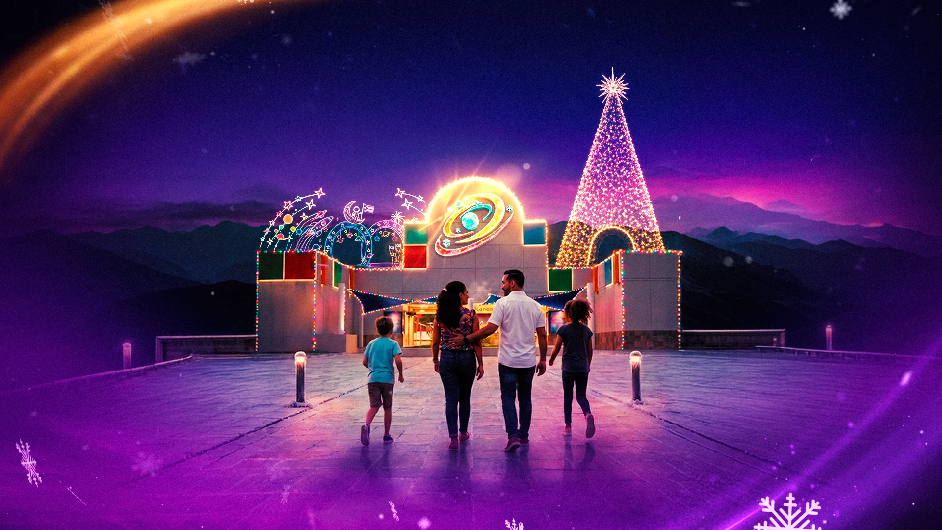 Una familia camina hacia la entrada de Parque de la Magia, iluminada con estrellas, luces y un gran árbol de Navidad.