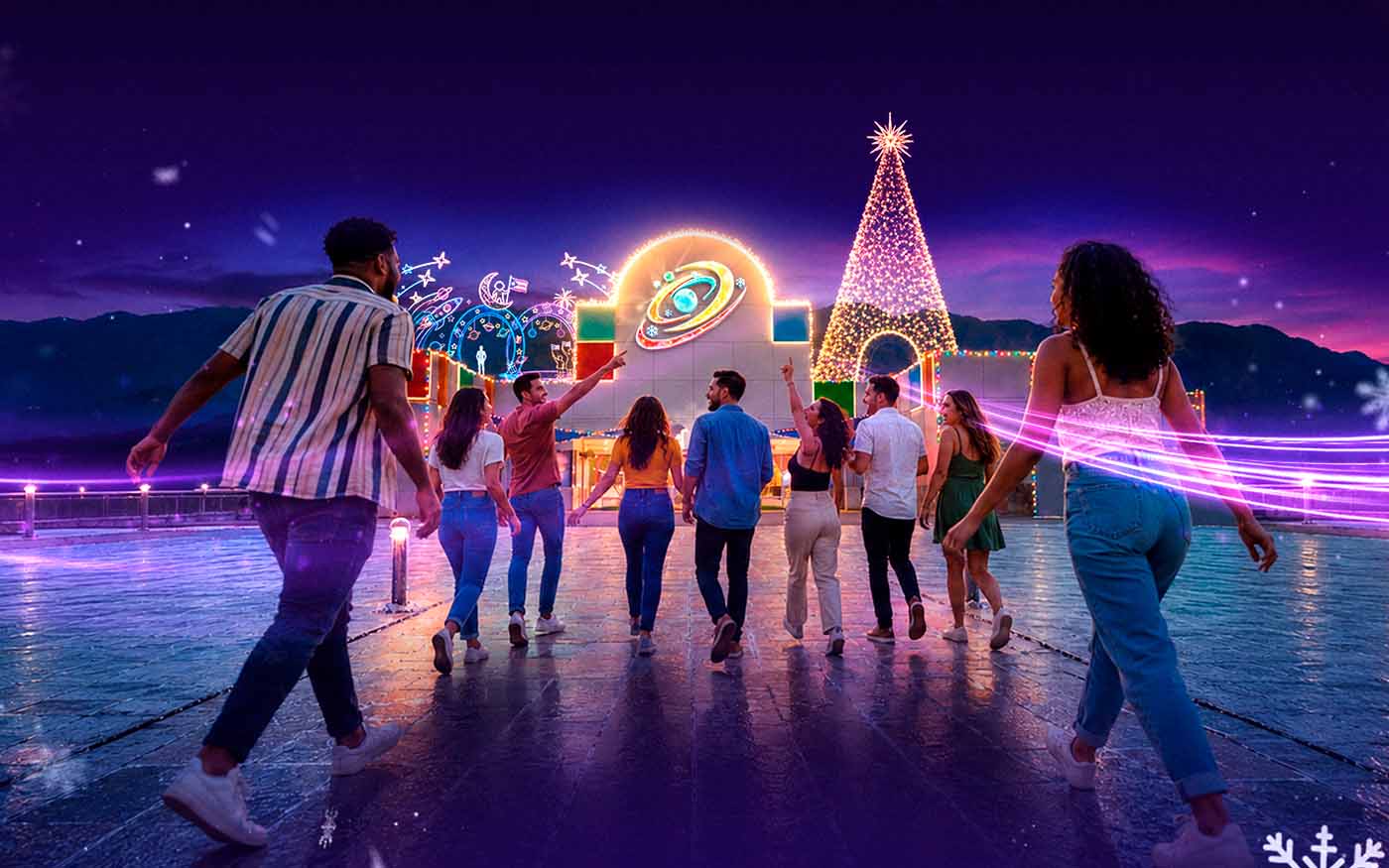 El corillo corre hacia la entrada iluminada del Parque de la Magia, con el logo de la galaxia y el árbol de luces.